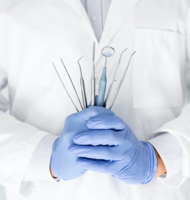 close-up-of-dentist-hands-with-dental-equipment.jpg close-up-of-dentist-hands-with-dental-equipment.jpg